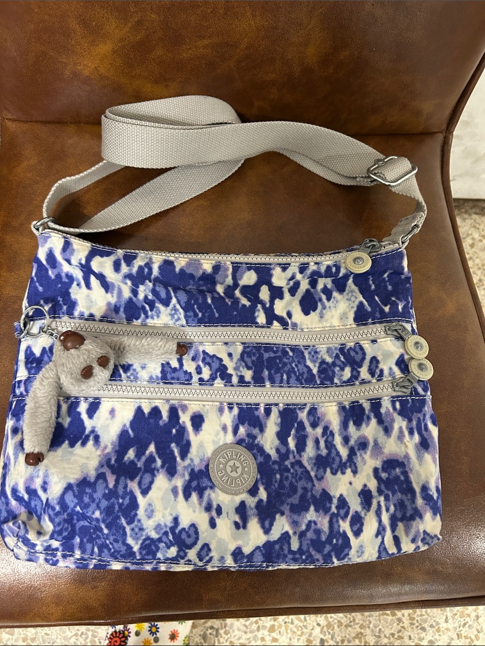 Kipling Blue and White Patterned Crossbody with Plush Monkey Charm